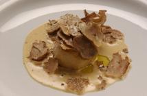  Boiled istrian potato with the peel covered with truffle sauce and fresh Tuber magnatum pico