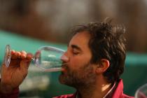 Moreno Coronica drinking a glass of wine
