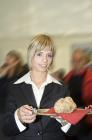  Fair hostess shows a truffle